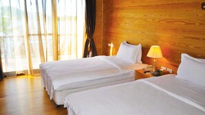 Luxury Twin Room, Patio, Courtyard View | In-room safe, desk, blackout curtains