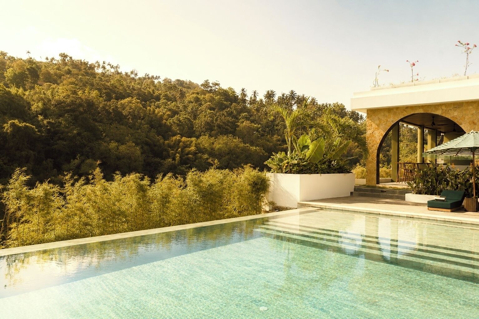 Outdoor pool, pool umbrellas, sun loungers