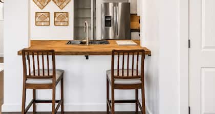 Small-Town Charm Meets Modern Comfort at Azalea Lane.