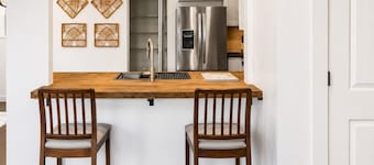 Small-Town Charm Meets Modern Comfort at Azalea Lane.