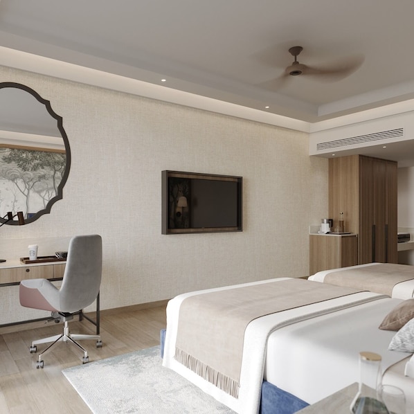A modern bedroom with a desk, a large mirror, a bed, and a wardrobe.