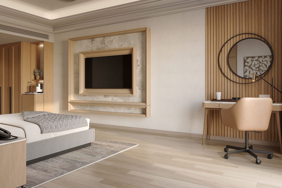Ein modernes Schlafzimmer mit Bett, Schreibtisch, Stuhl und einem großen Fenster.