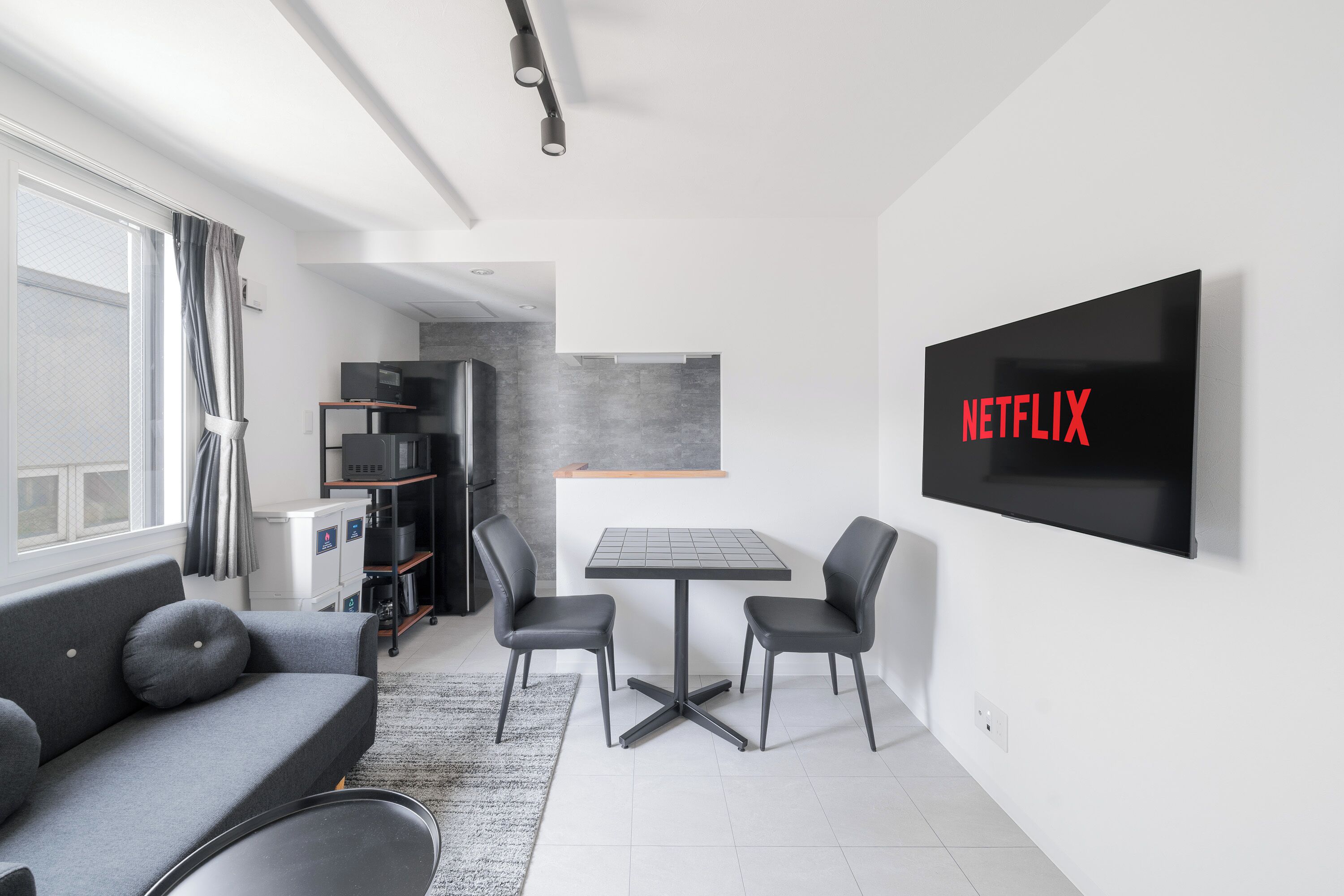 Apartment | Living area | 43-inch flat-screen TV with digital channels