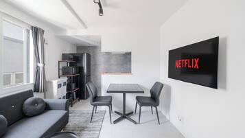Apartment | Living area | 43-inch flat-screen TV with digital channels