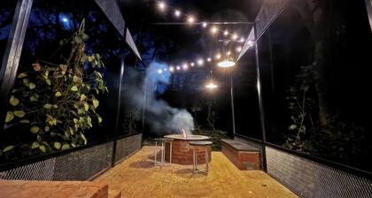 Container cabin retreat on a 70-acre Coorg estate with estate views