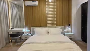 Deluxe Room, Balcony, City View | Desk, laptop workspace, blackout curtains, soundproofing