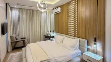 Deluxe Room, Balcony, City View | Desk, laptop workspace, blackout drapes, soundproofing
