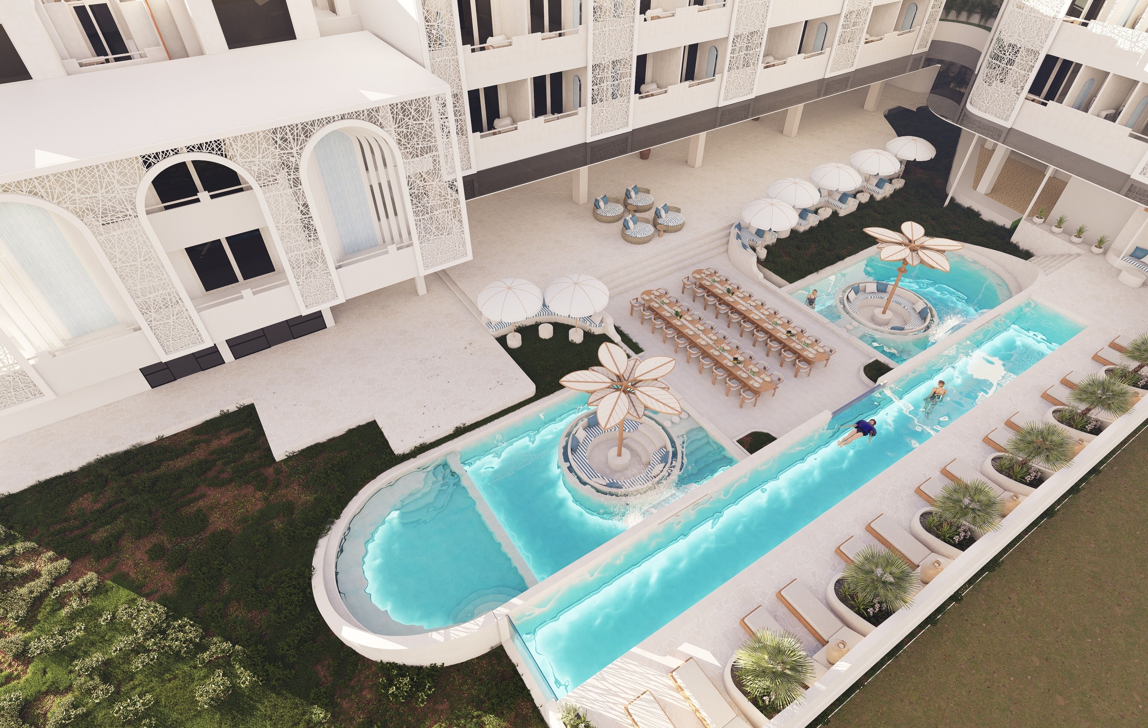 A rooftop pool with lounge chairs, umbrellas, and a circular water feature.