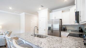 Exclusive Townhome, Garden View | Private kitchen | Coffee/tea maker, fridge, microwave, oven