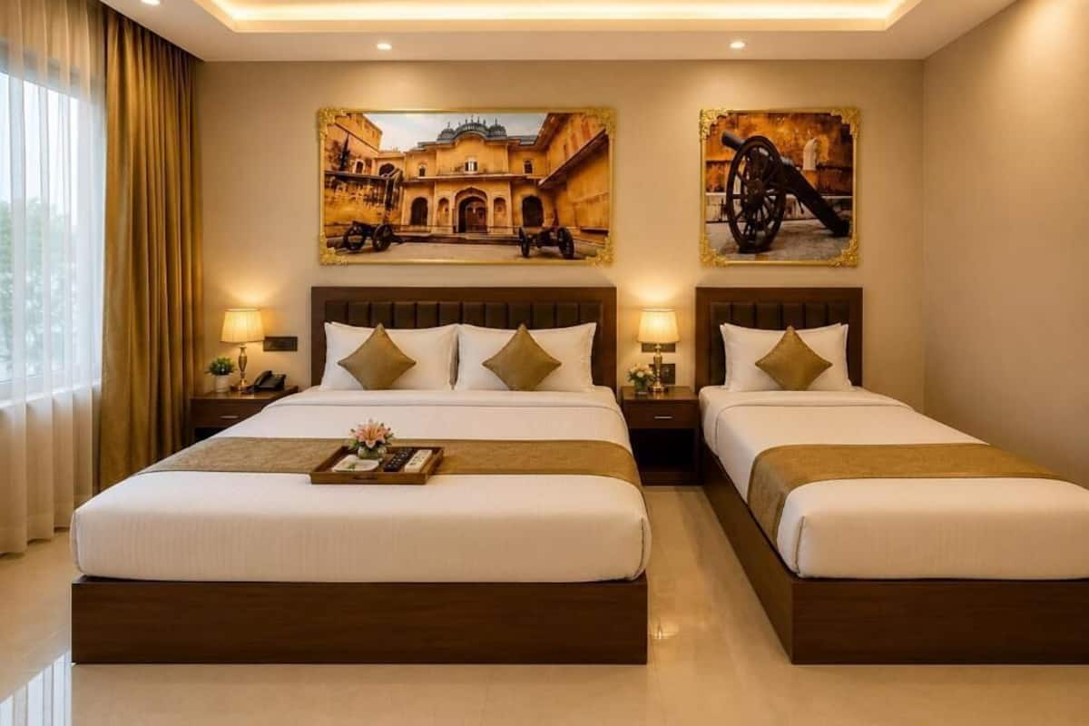 Family Double Room, Garden View | Minibar, in-room safe, desk, laptop workspace