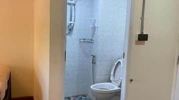 Twin Room, City View | Bathroom | Shower, free toiletries, towels, toilet paper