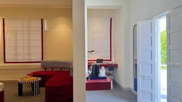 Suite, Courtyard View | Individually decorated, individually furnished, desk, laptop workspace
