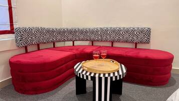 Suite, Courtyard View | Individually decorated, individually furnished, desk, laptop workspace
