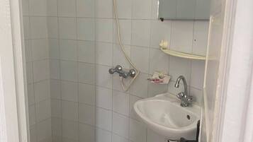 Shower, towels, soap, shampoo