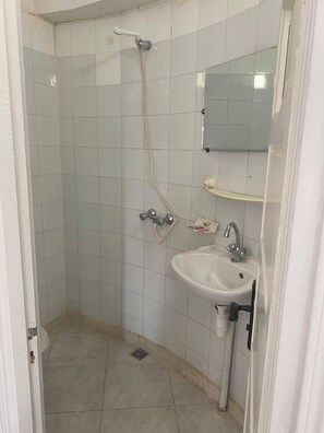 Dutxa, tovalloles, sabó i xampú 