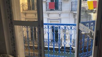 Basic Double Room, Balcony, City View | Laptop workspace, WiFi (free), bed sheets