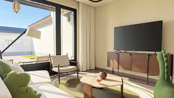Una moderna camera d'albergo con una grande finestra, una televisione a schermo piatto, un divano, una poltrona e un tavolino.