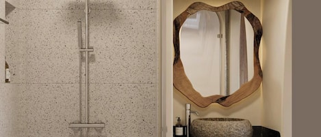 Shower, hair dryer, slippers, towels