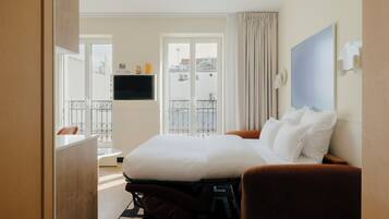 Apartment, 2 Bedrooms | Living area | 50-inch flat-screen TV with satellite channels, Netflix