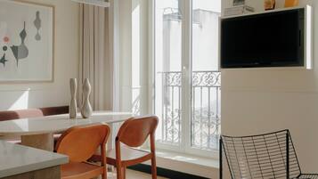 Apartment, 2 Bedrooms | Living area | 50-inch flat-screen TV with satellite channels, Netflix