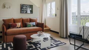 Premium bedding, blackout curtains, soundproofing, iron/ironing board