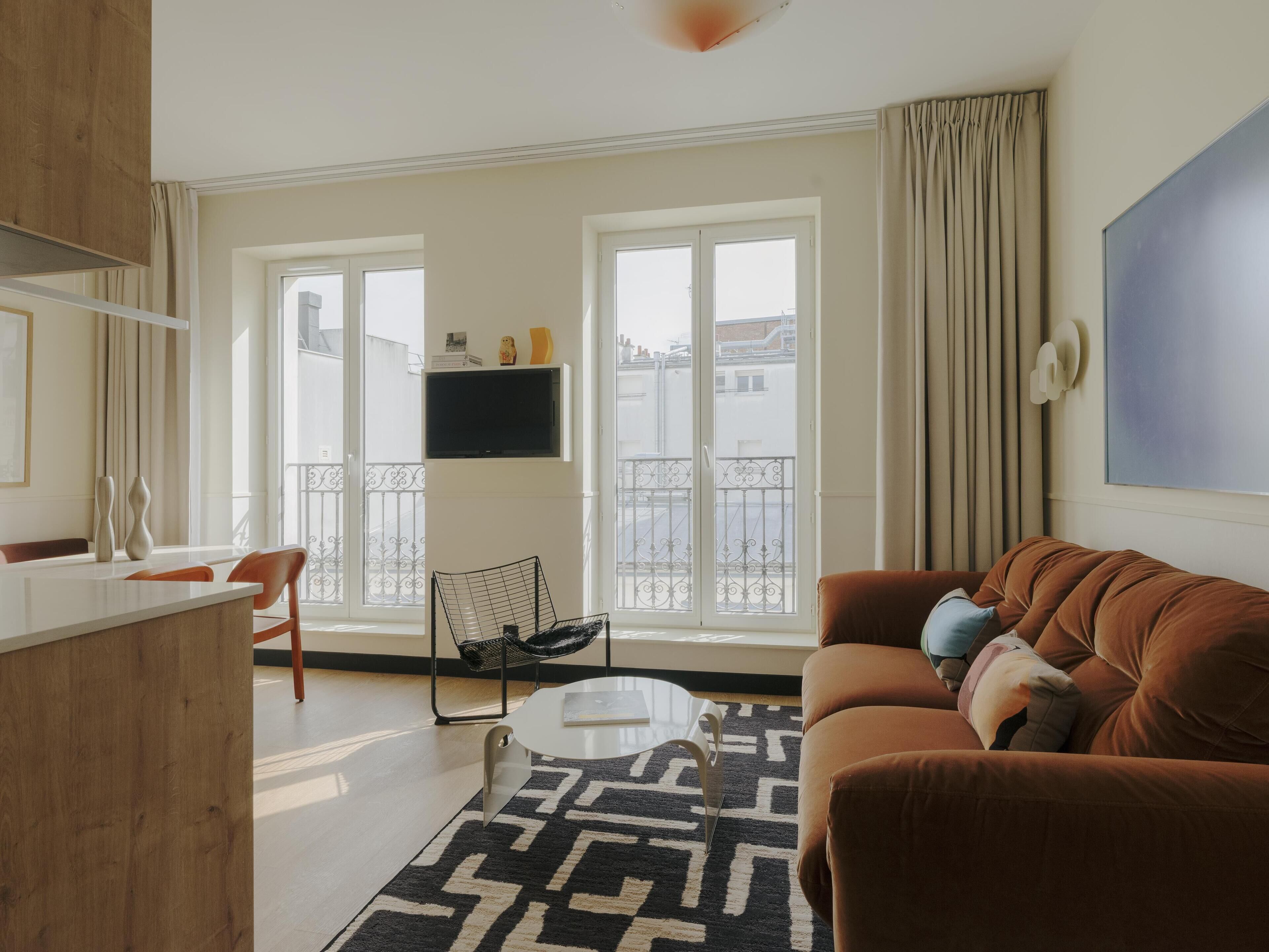 Apartment, 2 Bedrooms | Living area | 50-inch flat-screen TV with satellite channels, Netflix