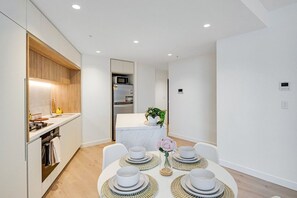 Dining - CBD Elegance | 2BR Apt w/Pool, Gym & City Views (Melbourne)