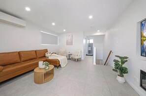 Living area - affordable modern getaway with parks/cafe nearby (WOODPARK)