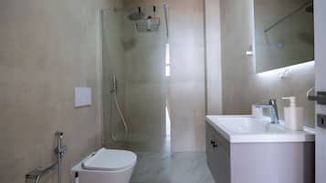 Shower, towels, soap, shampoo