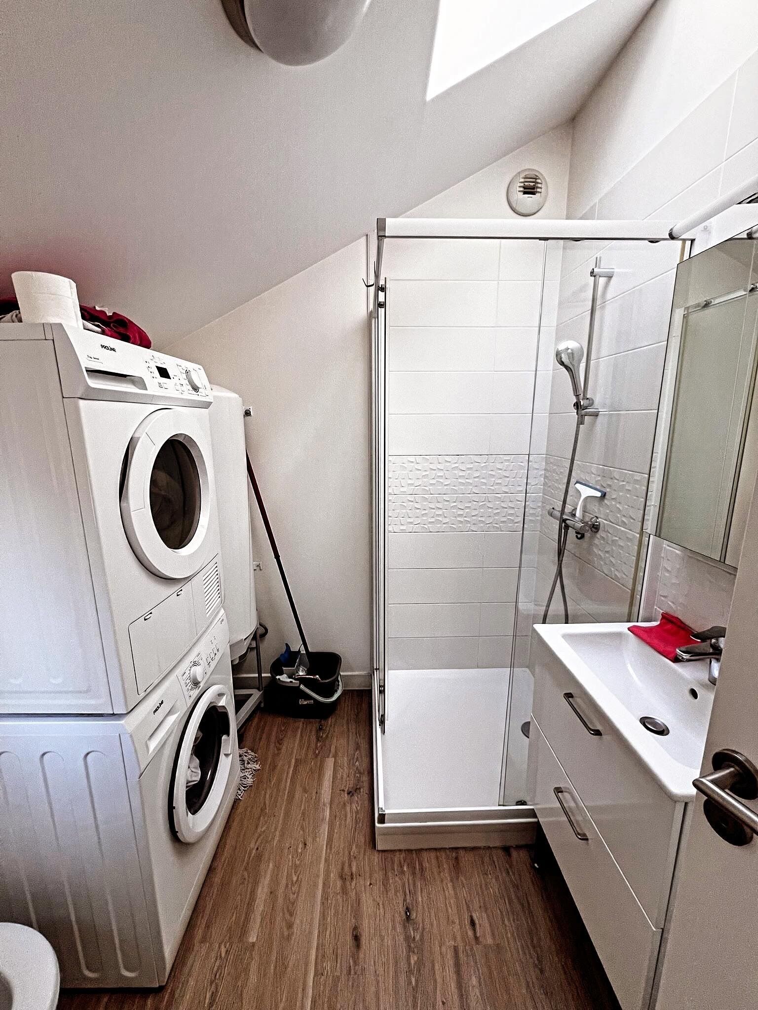Shower, towels, toilet paper