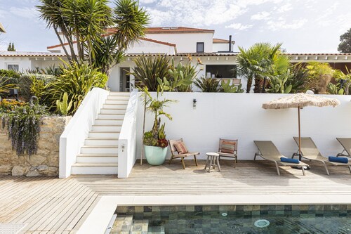 Estoril Contemporary Garden Villa by Cadenzalux