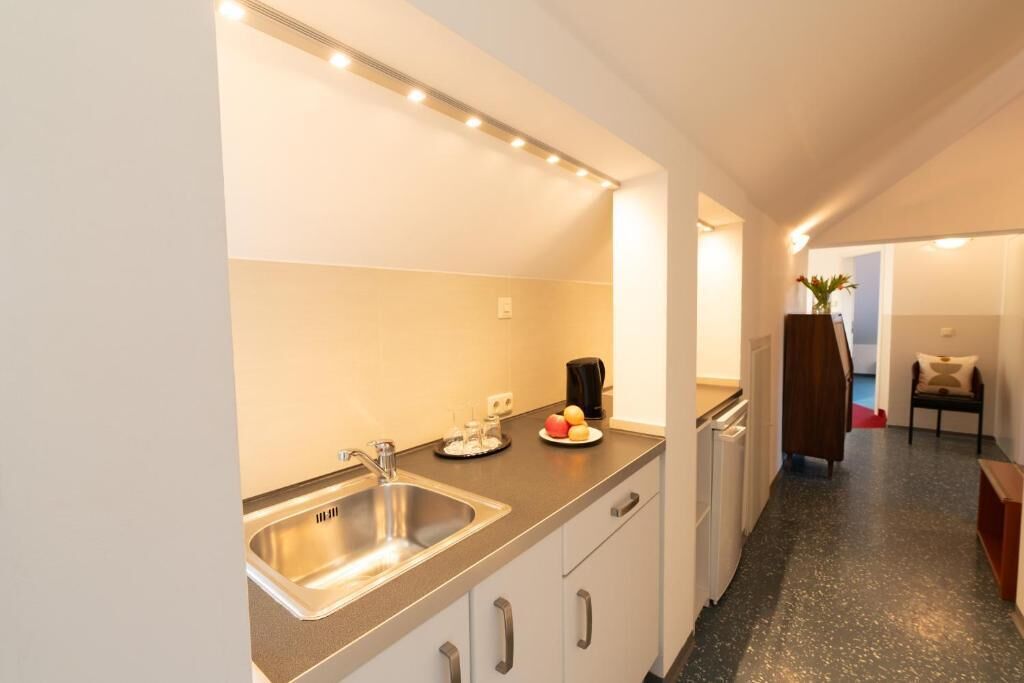 Family Suite, City View | Private kitchen