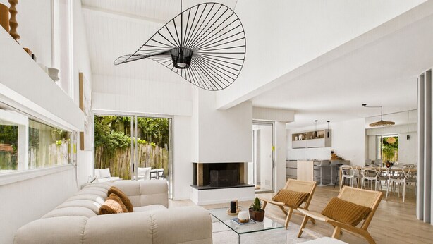 A modern living room with a sofa, chairs, a glass coffee table, and a fireplace. - 600m from beach, superb house for 8 (La Baule-Escoublac)