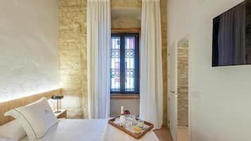 Coffres-forts dans les chambres, fer et planche Ă repasser
