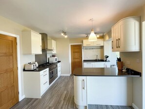 Fridge, microwave, oven, stovetop - Bay View | Swanage sea view, walk to beach, sleeps 9, dog friendly, hot tub (Swanage)