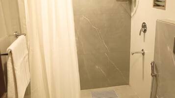 Hair dryer, bidet, towels, soap