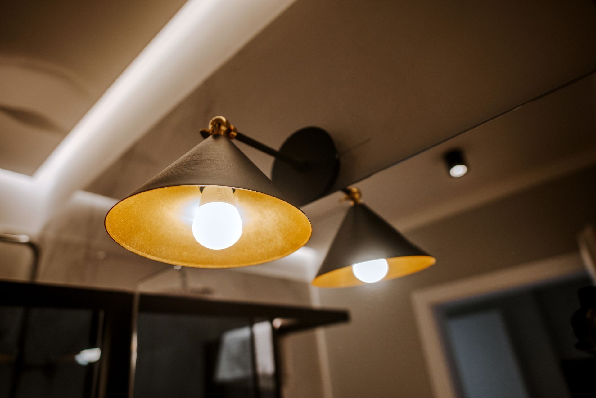 A ceiling with two pendant lights.