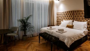 Suite Deluxe, vistas a la ciudad | Decoración individual, mobiliario individual, sistema de insonorización