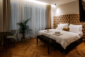 Deluxe suite, uitzicht op stad | Individueel gedecoreerd, individueel gemeubileerd, gratis wifi
