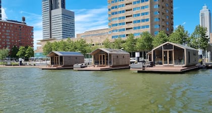 Wrap Boat No. 2 at Floating Rotterdam Rijnhaven with open swimmingpool nextdoor