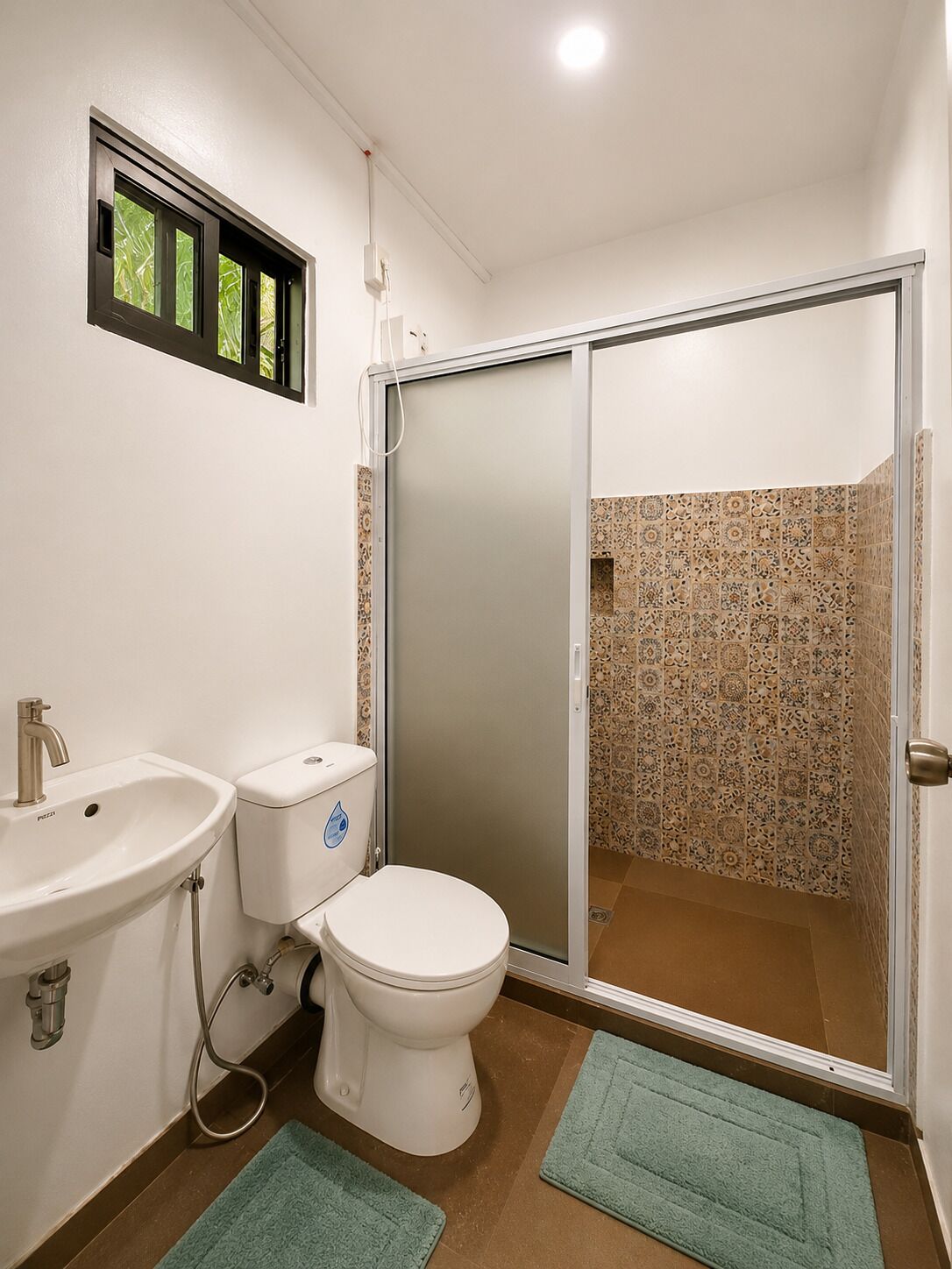 Shower, towels, soap, shampoo