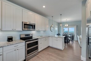 Private kitchen - Oceanfront 4 bedroom home, Elevator, Jacuzzi, Grill, Arcades, Pets welcome! (Port St. Joe)