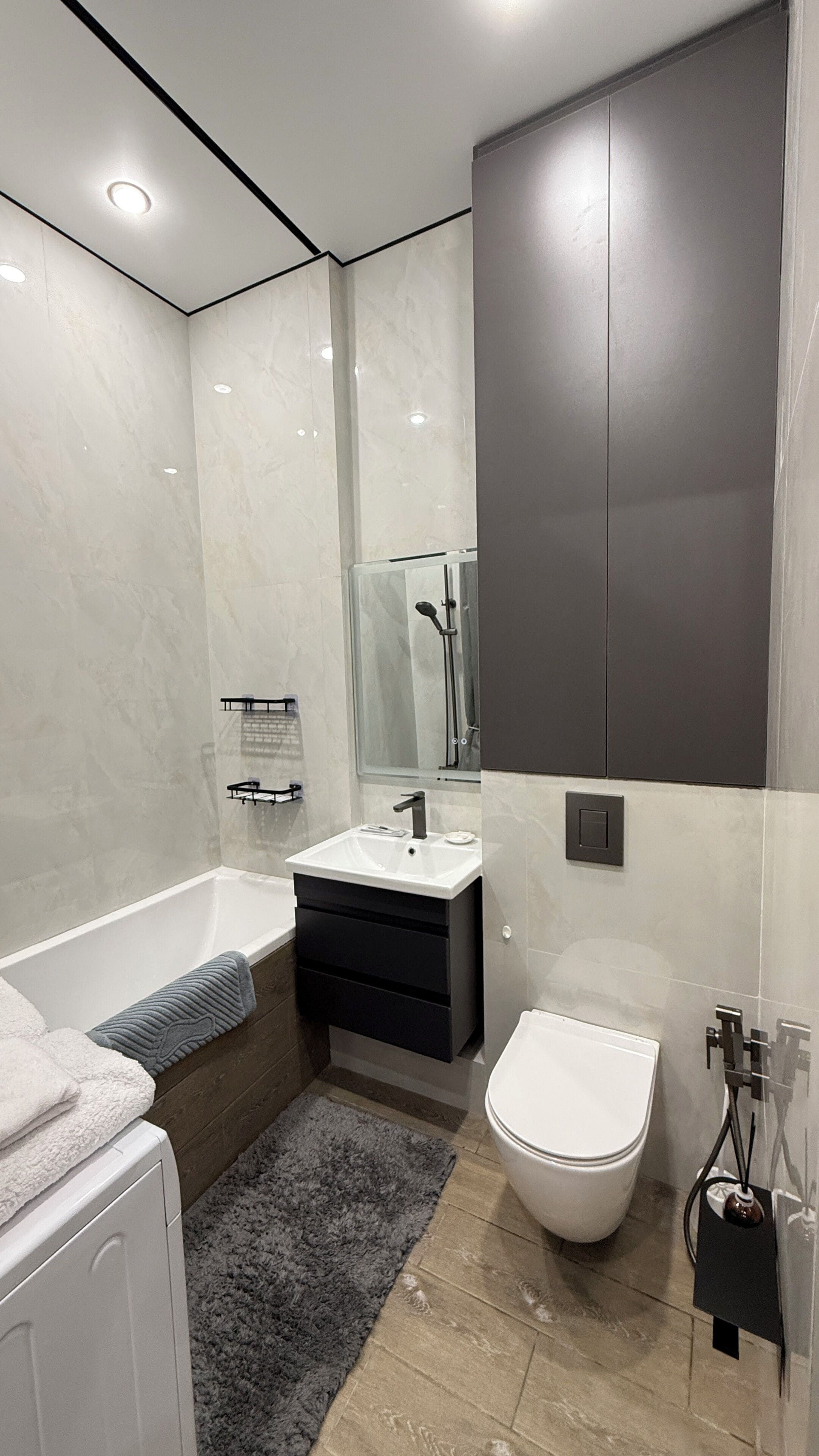 Hair dryer, bidet, towels, toilet paper