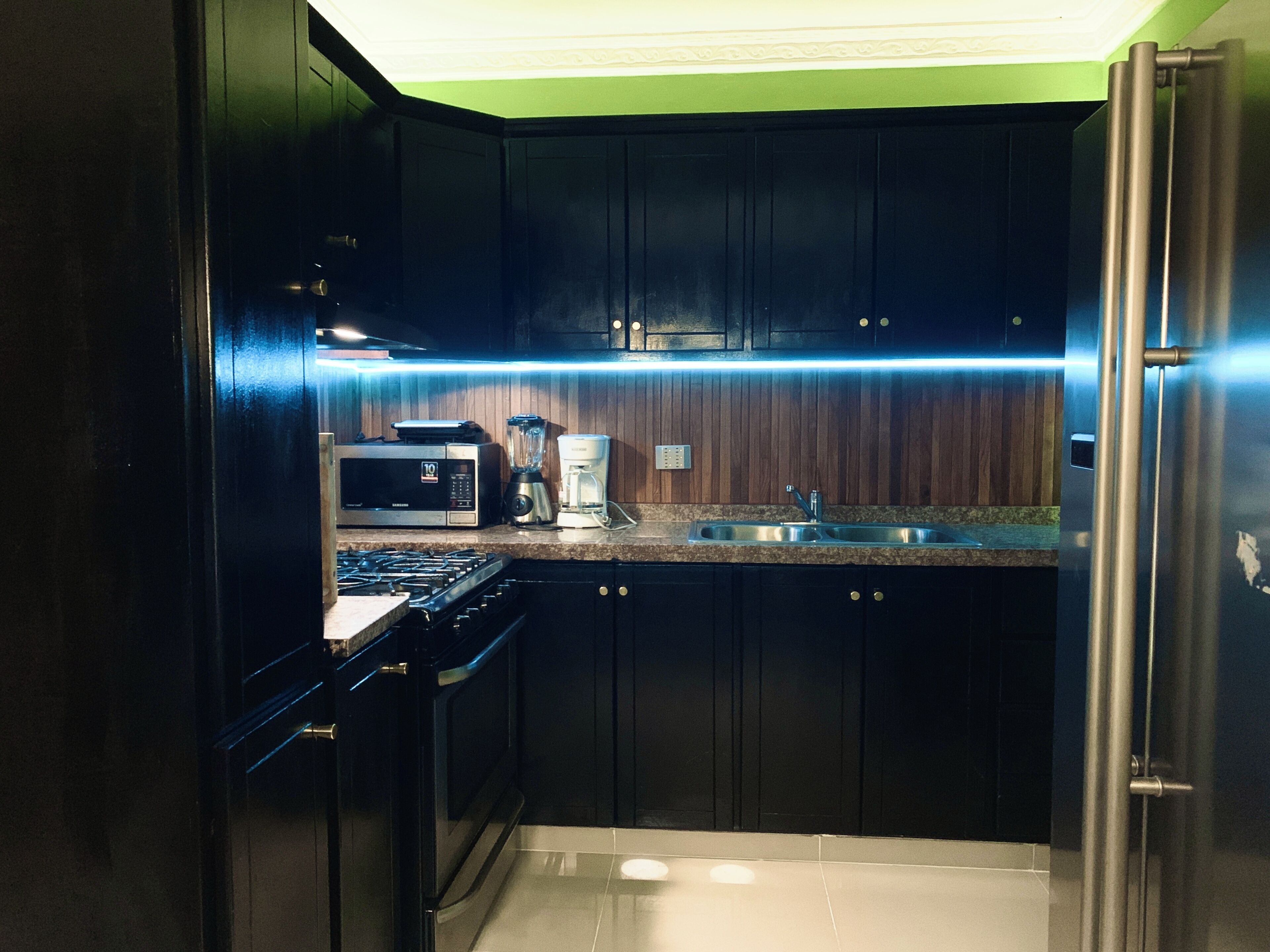 Coffee/tea maker, fridge, microwave, oven