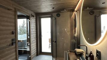 Shower, hair dryer, towels