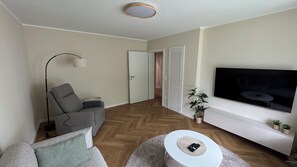 Living area - Stylish apartment with balcony and views of the countryside (Paderborn)