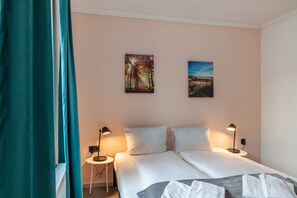 1 habitación, tabla de planchar con plancha, wifi y ropa de cama 
