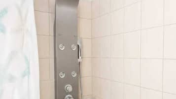 Shower, towels, soap, toilet paper