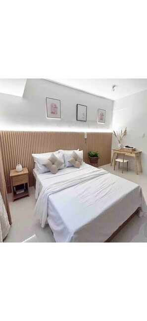 Een strijkplank/strijkijzer, wifi, beddengoed, rolstoeltoegankelijk