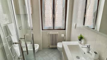 Hair dryer, bidet, towels, soap